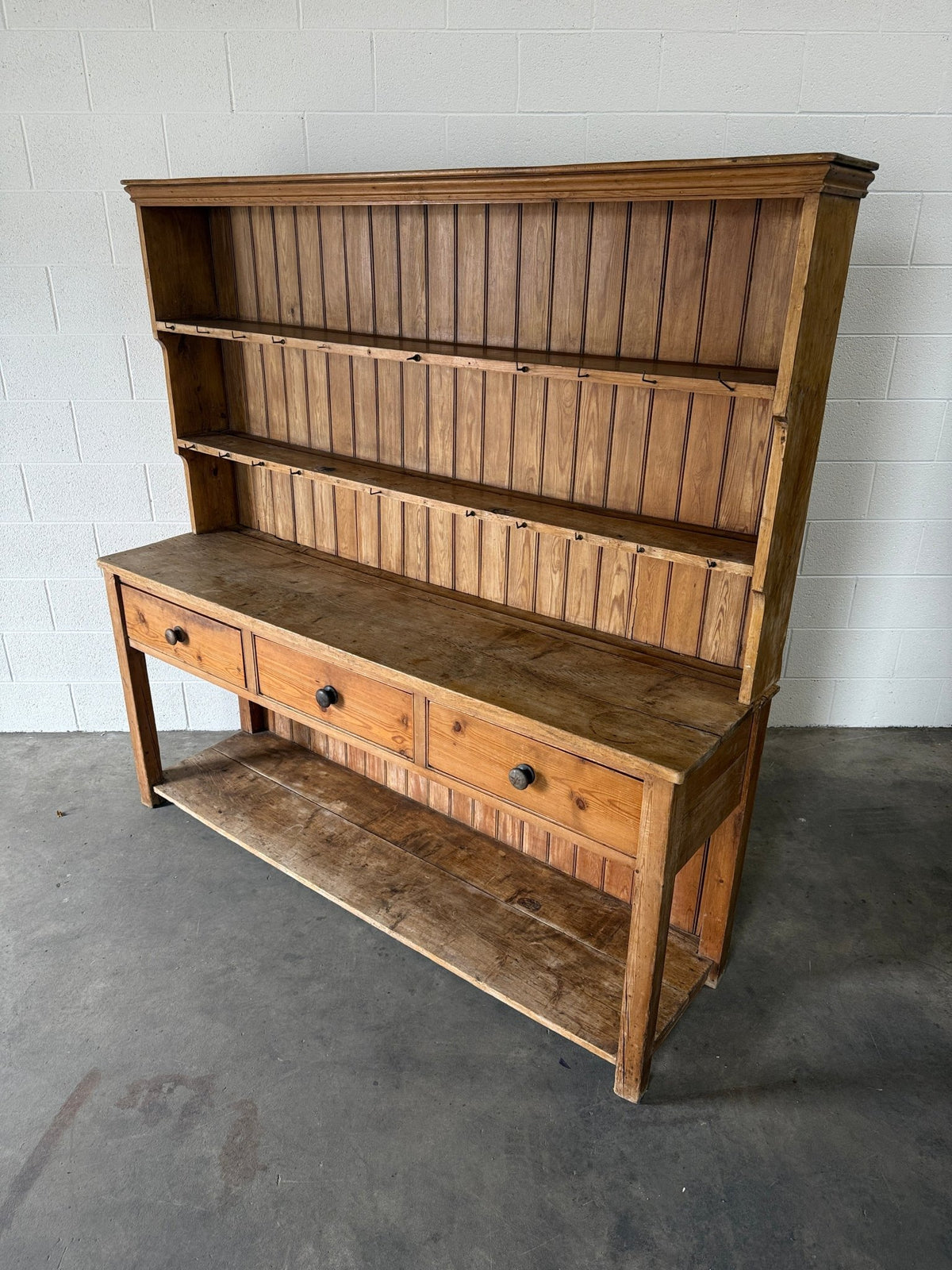 Simple antique English pine kitchen dresser with potboard base - House on Horizon