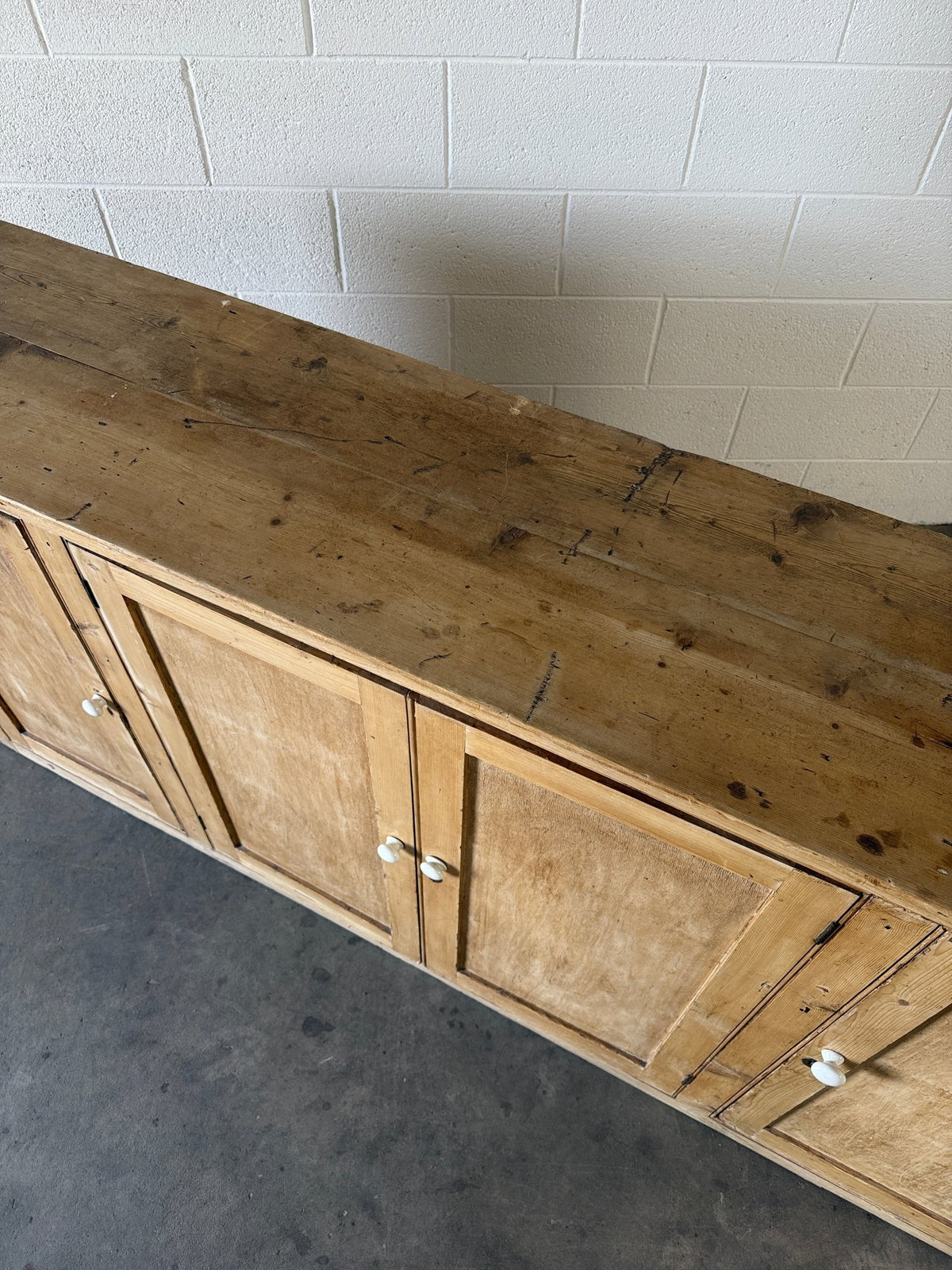 Simple antique pine sideboard with four doors - House on Horizon