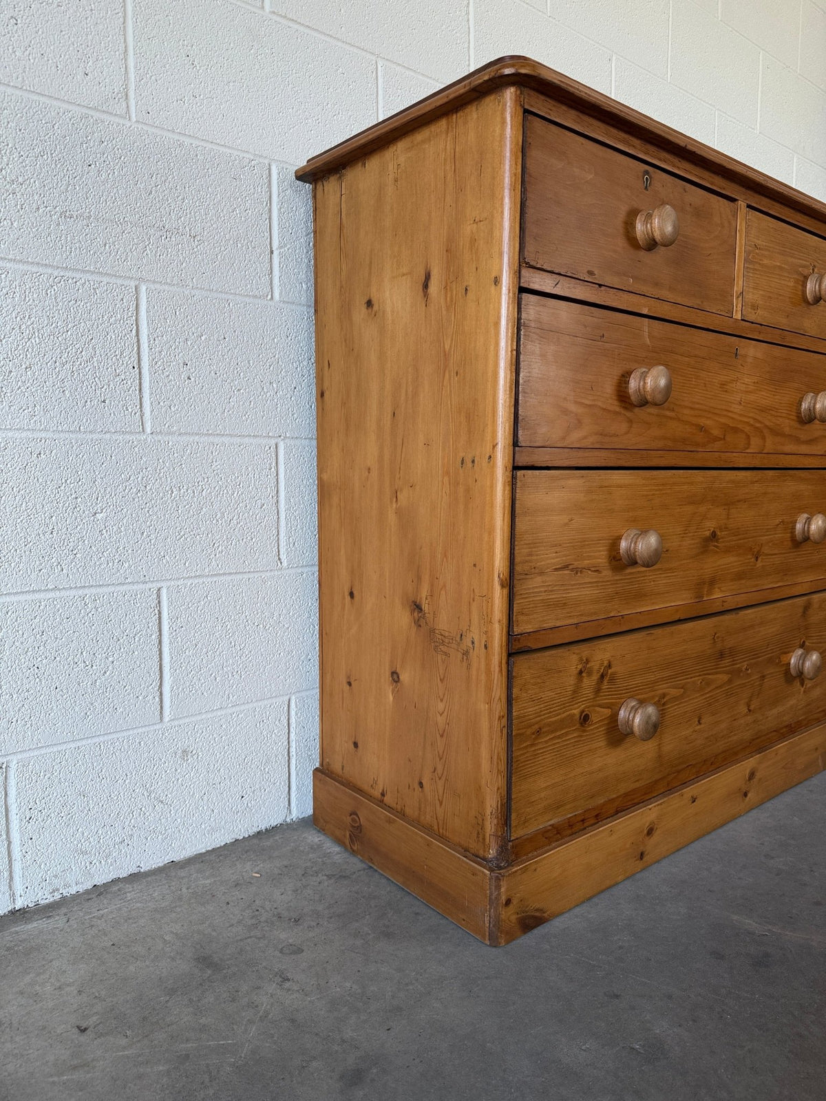 Solid antique pine chest of drawers set on plinth base - House on Horizon