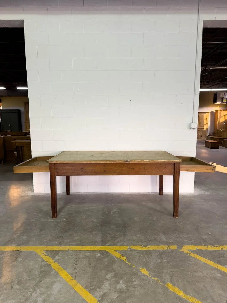 Antique English dining table with drawers