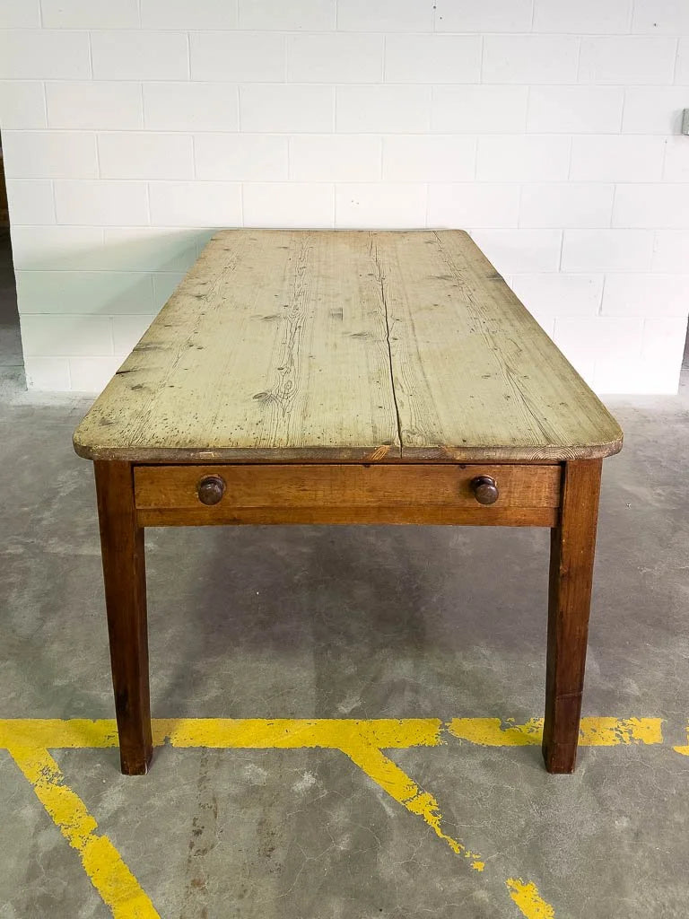 Antique English dining table with drawers