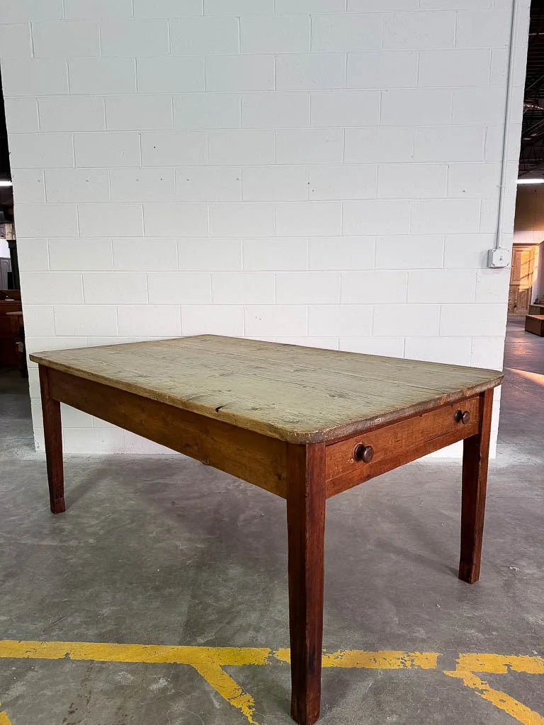 Antique English dining table with drawers
